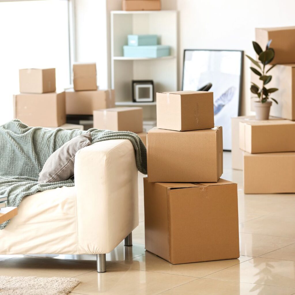Packed moving boxes in a living room